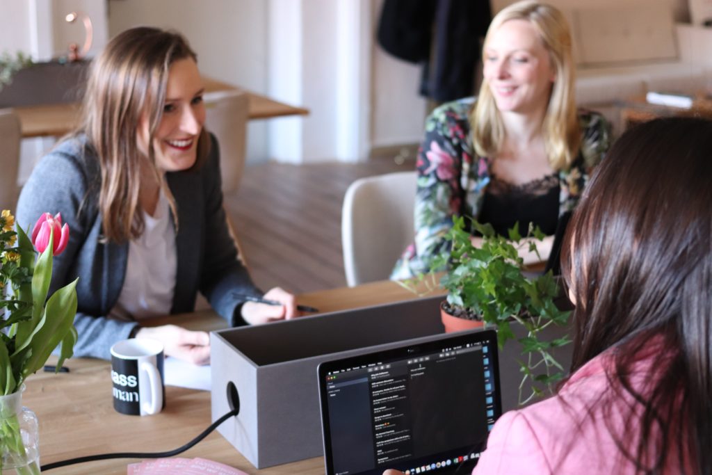 Three women in a meeting