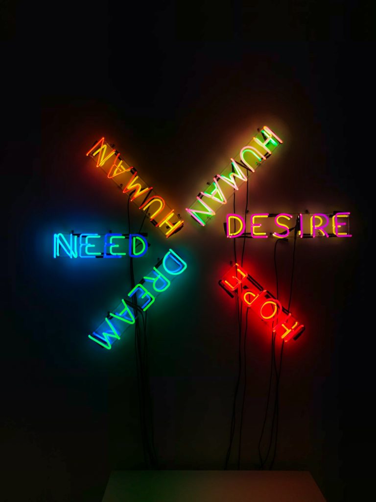 Neon light artwork using words